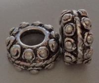 Pandora style metalen kralen rondel bewerkt en met rubberen stopper Â± 12x5mm (gat Â± 5mm)
