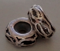 Pandora style metalen kralen rondel bewerkt en met rubberen stopper Â± 12x4mm (gat Â± 5mm)